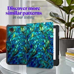 May include: A tablet case with a vibrant teal and blue stained-glass leaf pattern. The case is open, revealing the tablet screen. The text "Discover more similar patterns in our listing" is displayed in purple.