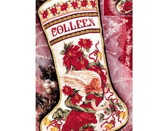 完成したクロスステッチのクリスマスストッキングのパーソナライズされたクリスマスギフトは、NatalieARTEmbroidery によってオーダーメイドで製作されます。