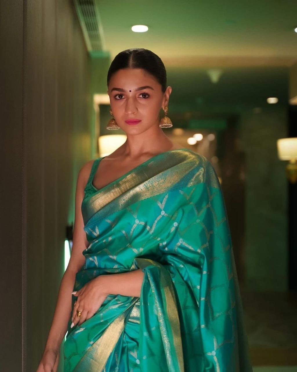 dark peacock green colour saree