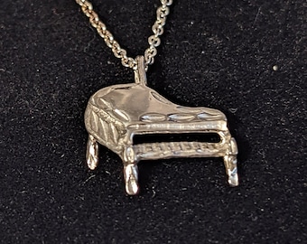 Sterling Silver piano pendant on cable chain