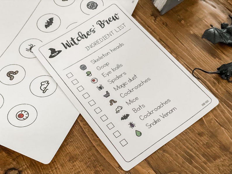 May include: A printable Halloween-themed checklist for a witch's brew. The checklist includes ingredients like skeleton heads, goop, eyeballs, spiders, magic dust, cockroaches, mice, bats, and snake venom. The checklist is printed on white paper with black ink.