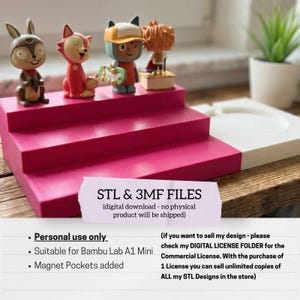 May include: A display of four colorful figurines on a tiered pink platform. The figurines include a brown rabbit, a red fox, a blue and orange character with a skateboard, and a small figure on a pedestal. Text on the image reads "STL & 3MF FILES".