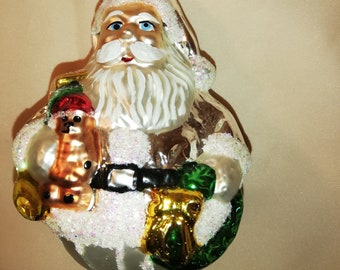 cute Santa Claus as a Christmas tree ball