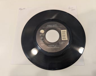 Guns N' Roses "Paradise City / Move To The City" Vinyle 7" Single (EX+ face A / VG+ solide face B ; microfibre nettoyée à la main ; qualité lecture EX+)