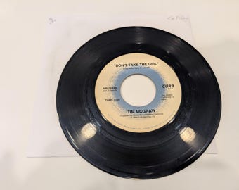Tim McGraw "Indian Outlaw (Radio Mix) / Don't Take The Girl" Vinyl 7" Single (strong VG+ visual / EX play-grade; microfiber hand cleaned)