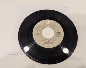 Yes "Owner Of A Lonely Heart / Our Song" Vinyl 7" Single (EX disc; nice!; microfiber hand cleaned)