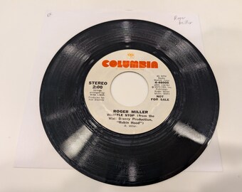 Roger Miller « Whistle Stop (Stéréo) / Whistle Stop (Mono) » Vinyle 7" Single (Rare promo Walt Disney de 'Robin des Bois' 1973 ; disque EX)