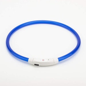 May include: A blue LED dog collar with a white control panel featuring a red power button.