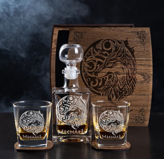 Wolf-engraved whiskey decanter set boxed in engraved wood — a complete, giftable package with strong visual identity and solid demand signal.