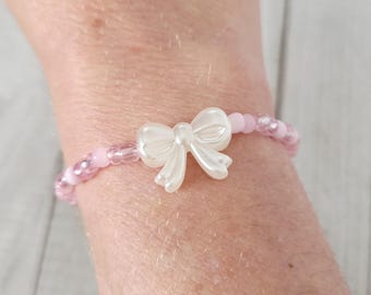 Rosa Schleife Perlen Armband • Pastell Glas Stretch Armband • Zierlicher Kokette Schmuck Geschenk für Sie