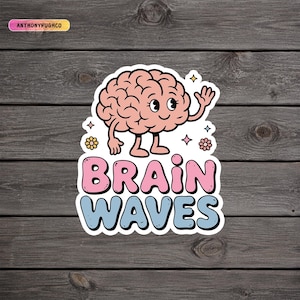 May include: A die-cut sticker featuring a cartoon brain with arms and legs waving, surrounded by small stars and flowers. Below the brain, the text reads BRAIN WAVES in large, bold, pink and light blue bubble letters. The sticker has a white border.