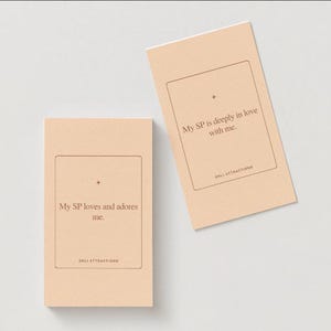 May include: Two rectangular cards with text. One card reads "My SP loves and adores me." The other card reads "My SP is deeply in love with me." Both cards have a light brown background with a dark brown border and text.