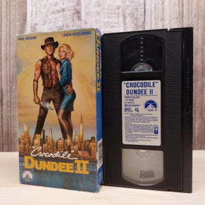 Crocodile Dundee II (1988) | Used VHS Tape | Classic Movie Collectible