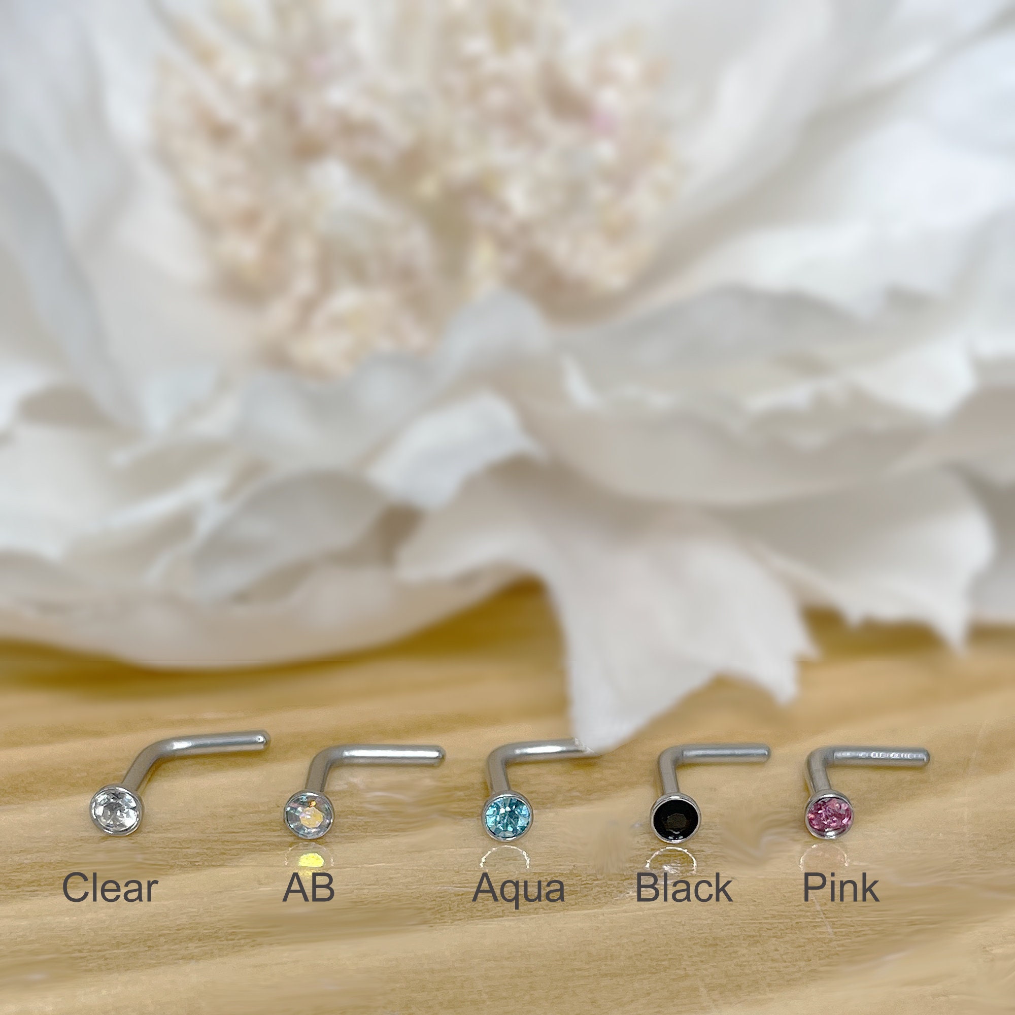 316L Surgical Steel Aqua CZ Star Ball End Nose Ring Stud 316L Surgical Steel Aqua CZ Star Ball End Nose Ring Stud
