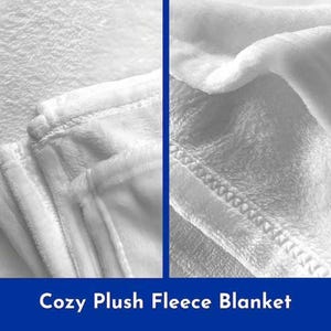 May include: A white plush fleece blanket folded in half, showing the soft texture of the fabric. The blanket is made of a cozy and comfortable material, perfect for snuggling up on the couch.