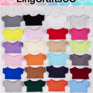 May include: A selection of miniature t-shirts in a variety of colours, such as grey, black, white, yellow, pink, red, purple, beige, green, orange, blue, brown, and maroon. The image includes the text "LingCraftsCO".