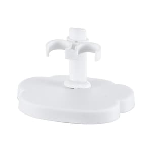 May include: White plastic stand with three prongs for holding toothbrushes. The stand has a cloud-shaped base.