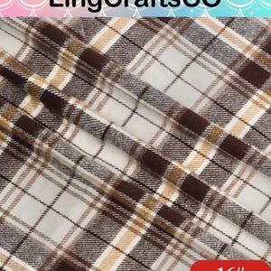 May include: A fabric featuring a plaid pattern in shades of dark brown, tan, and white. The material is folded, creating diagonal ridges across the surface. The text LingCraftsCO is visible at the top, and the number 16# is printed in a red box.