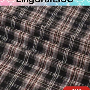 May include: A fabric featuring a black, white, and brown plaid pattern with a repeating grid design. The textile displays soft folds and a woven texture. The image includes the text LingCraftsCO at the top and the number 18# in a red box.