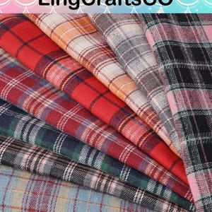 May include: A collection of folded fabric pieces featuring various plaid patterns in red, orange, beige, grey, black, green, and blue. The fabric has a soft, textured appearance with visible woven lines. The text LingCraftsCO is at the top.