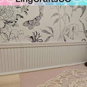May include: White wainscoting with a decorative trim, featuring a black and white floral wallpaper with a butterfly design. The wallpaper has the text "LingCraftsCO" at the top.