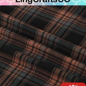 May include: A fabric featuring a plaid pattern in shades of black, dark gray, and muted brown. The textile displays a woven appearance with intersecting horizontal and vertical lines. The text LingCraftsCO appears at the top, and 17# is in the corner.