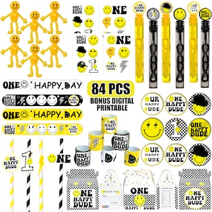 May include: A set of 84 party supplies with a black and yellow color scheme featuring a smiley face with a lightning bolt and the text "One Happy Dude". The set includes party favors, decorations, and tableware.