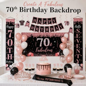 May include: A 70th birthday party setup with a black and rose gold theme. Includes a backdrop, balloons, cake, banner, and decorations. The backdrop reads "70 & Fabulous". The banner says "Happy Birthday".