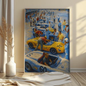 May include: A framed painting depicts a vintage car race scene. The artwork features several classic race cars in yellow and light blue, with the numbers 76 and 60 prominently displayed. People in period clothing are gathered around the cars, creating a sense of nostalgia.