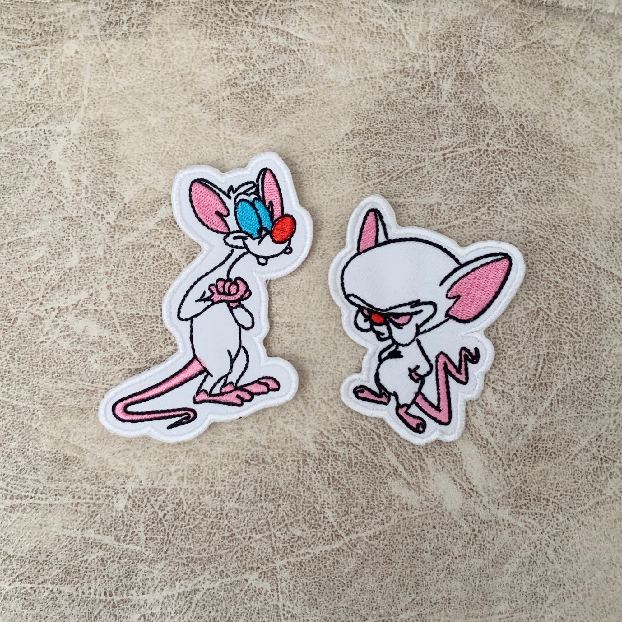 Alfombrilla De Mouse 'The Brain' (Pinky & The Brain) - Perfil Bajo, Tamaño 23.6x19.8 Cm - Oficial Warner Bros.