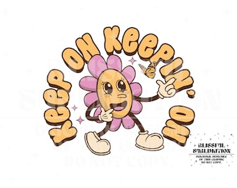 Pode incluir: Uma flor de desenho animado amarela e laranja com um rosto sorridente e pétalas cor-de-rosa. A flor está levantando um dedo e tem uma borboleta voando ao lado dela. O texto "Keep on Keepin' On" está escrito em um círculo ao redor da flor.