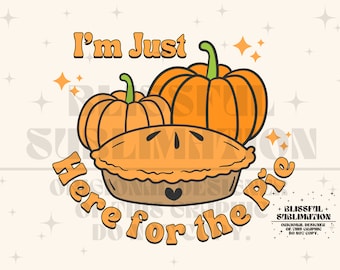 May include: A digital illustration of a pie with a smiling face, surrounded by two pumpkins and the text "I'm Just Here for the Pie".