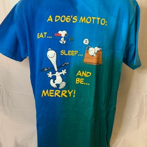 Vintage Peanuts Snoopy “A Dog's Motto. Eat. Sleep. And be Merry!” T-Shirt