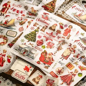 May include: A selection of vintage Christmas stickers with festive imagery including Santa Claus, Christmas trees, and ornaments. The stickers feature text such as "Merry Christmas" and "Season".