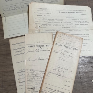 May include: A collection of vintage legal documents from Vermont, including Justice Trustee Writs and a Justice of the Peace receipt dated December 29, 1908. The off-white papers feature black printed text, handwritten names, dates, and financial figures.