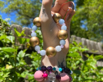 6 1/2” AA grade lavender amethyst, blue aventurine, and wooden bead bracelet