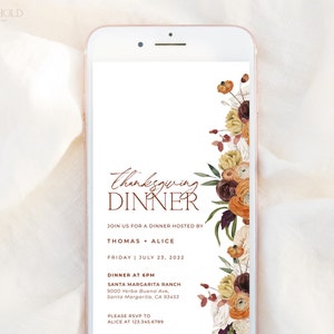 May include: A digital invitation on a smartphone screen for a Thanksgiving dinner. The invitation features the words "Thanksgiving Dinner" in a script font, with floral accents in shades of orange, brown, and cream. Details include the date, time, and location.