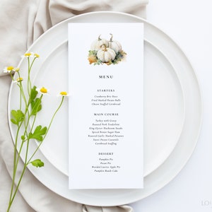 May include: A Thanksgiving menu with a watercolor illustration of white pumpkins. The menu includes starters, main course, and dessert options.