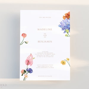 May include: A wedding invitation featuring a floral design. The invitation is for Madeline and Benjamin, and it is set for 5th April 2023, at 2:00 PM. The invitation includes the address for the wedding ceremony and reception.