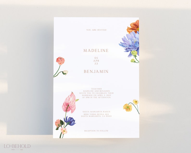 May include: A wedding invitation featuring a floral design. The invitation is for Madeline and Benjamin, and it is set for 5th April 2023, at 2:00 PM. The invitation includes the address for the wedding ceremony and reception.