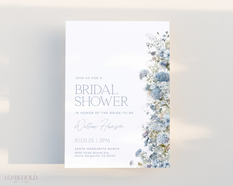 May include: A blue and white floral bridal shower invitation with the text "Join us for a Bridal Shower in honor of the bride-to-be Willow Herson 10.02.25 | 3PM Santa Margarita Ranch 9000 Yerba Buena Ave, Santa Margarita, CA 93453"