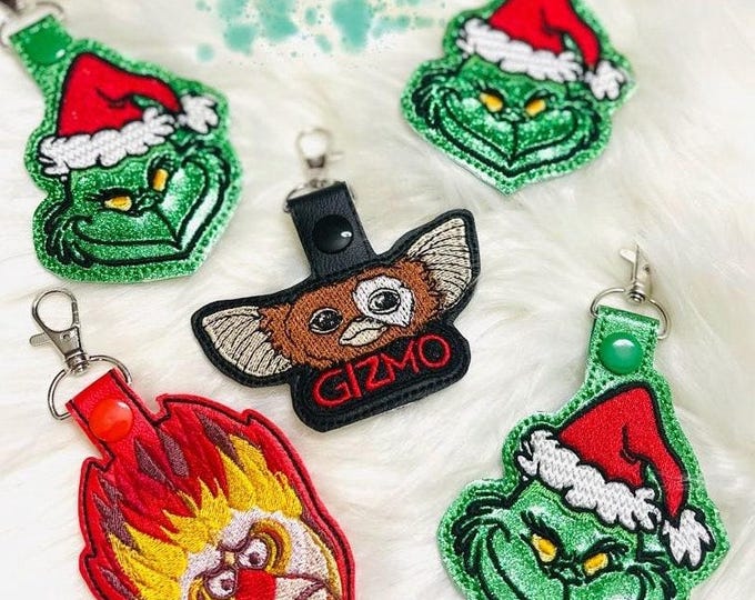 Embroidered Gizmo, Heat Miser, Grinch Bag Tags, Retro Christmas Movie Keychains (Glitter)