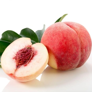May include: A ripe peach, with a fuzzy red and yellow exterior, and a sliced half revealing the textured seed and pale flesh. Green leaves are visible in the background. The fruit is a popular summer treat.