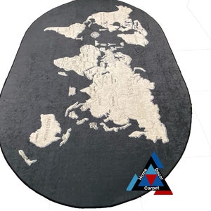 May include: A black oval rug with a white outline of the world map. The rug has the text "Home Decor Carpet" in a triangle at the bottom.