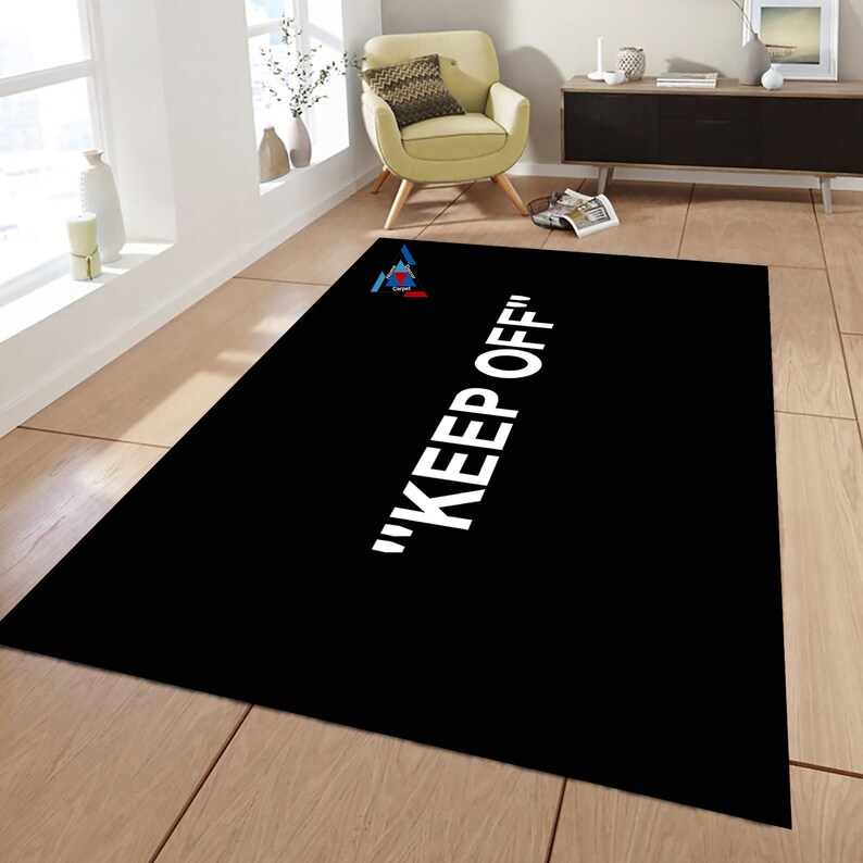 May include: Black and white doormat with the text "KEEP OFF" in white lettering.