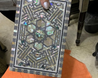Decorated box inlaid with blue paua shells and white mother of pearl