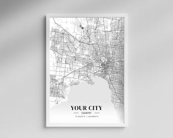 May include: Black and white city map print with the text "YOUR CITY" and "COUNTRY" along with the coordinates "37.8229°S / 144.9803°E".