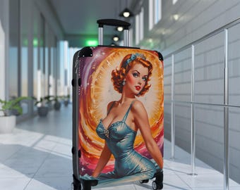 May include: A vintage-style suitcase with a colorful illustration of a woman in a blue dress and a crown. The background is a swirling galaxy of colors.