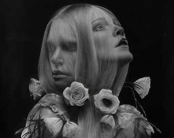May include: A black and white drawing of a woman with long hair, her face is obscured by her hair, and she is wearing a floral crown. The drawing is done in a realistic style.