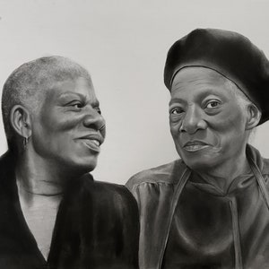 May include: A black and white portrait of two women. One woman is smiling, wearing a dark top and a small hoop earring. The other woman is wearing a beret and a dark top, looking directly at the viewer.